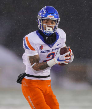 Dec 12, 2020; Laramie, Wyoming, USA; Boise State Broncos wide receiver Khalil Shakir (2) runs against the Wyoming Cowboys during the first quarter at Jonah Field at War Memorial Stadium. Mandatory Credit: Troy Babbitt-USA TODAY Sports